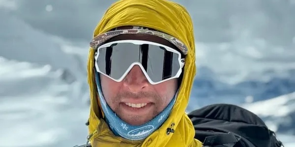 Jim Philpott in goggles on a snowy summit